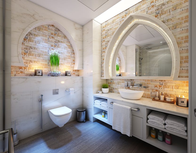 bathroom fitter tunbridge wells Elegant modern bathroom with marble tiles, ambient lighting, and stylish decor.